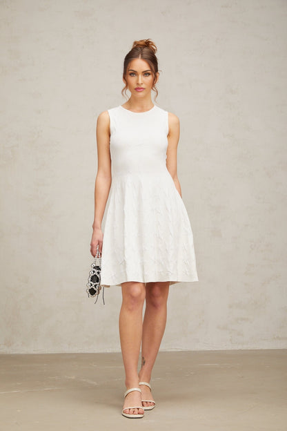 White mini dress with star pattern knit fabric and jasmine design elements