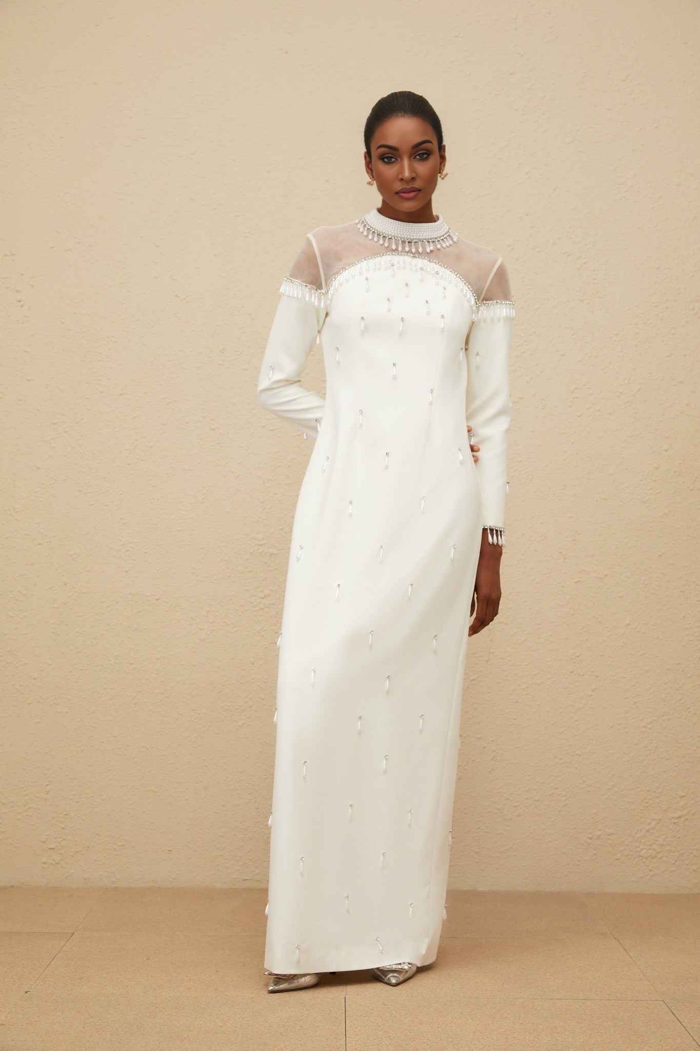 White mock neck long sleeve maxi dress with tulle and embellishments
