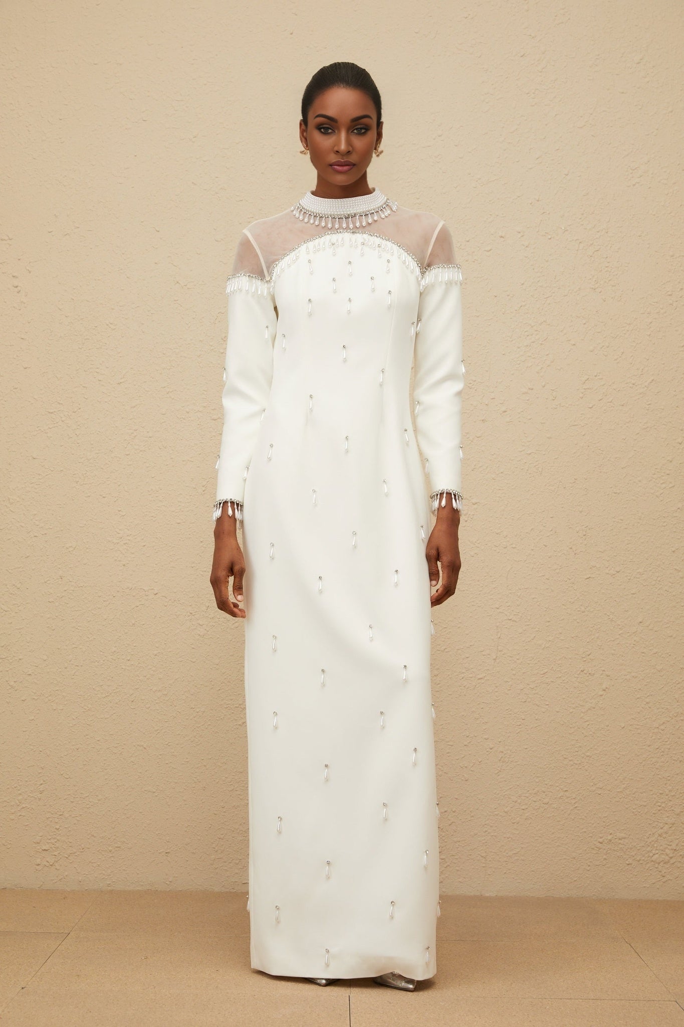 White mock neck long sleeve maxi dress with tulle and embellishments