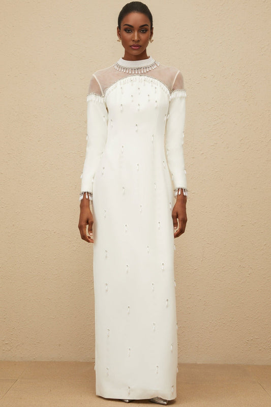 White mock neck long sleeve maxi dress with tulle and embellishments
