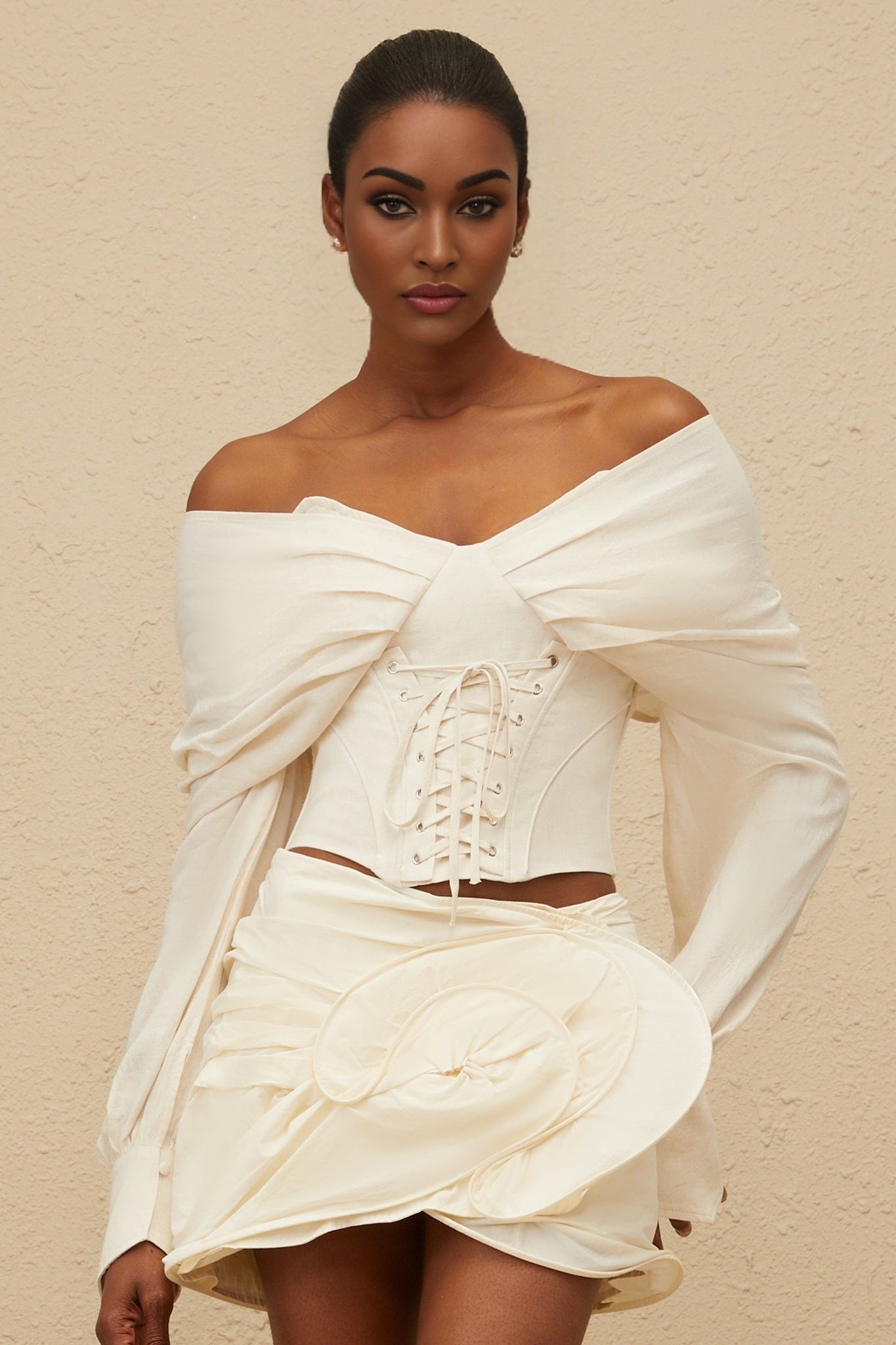 White off the shoulder cropped top with lace-up and ruched detailing
