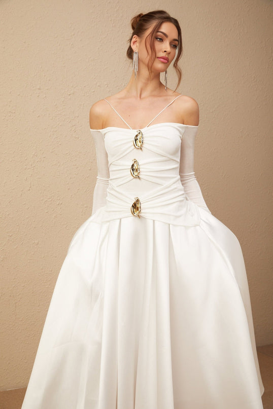 White offshoulder maxi dress with panelled design and long flowing skirt