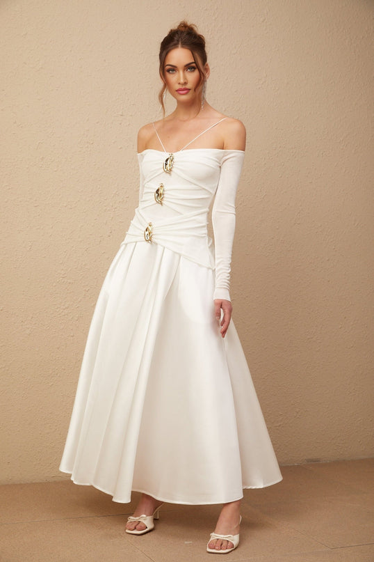 White offshoulder maxi dress with panels worn by model