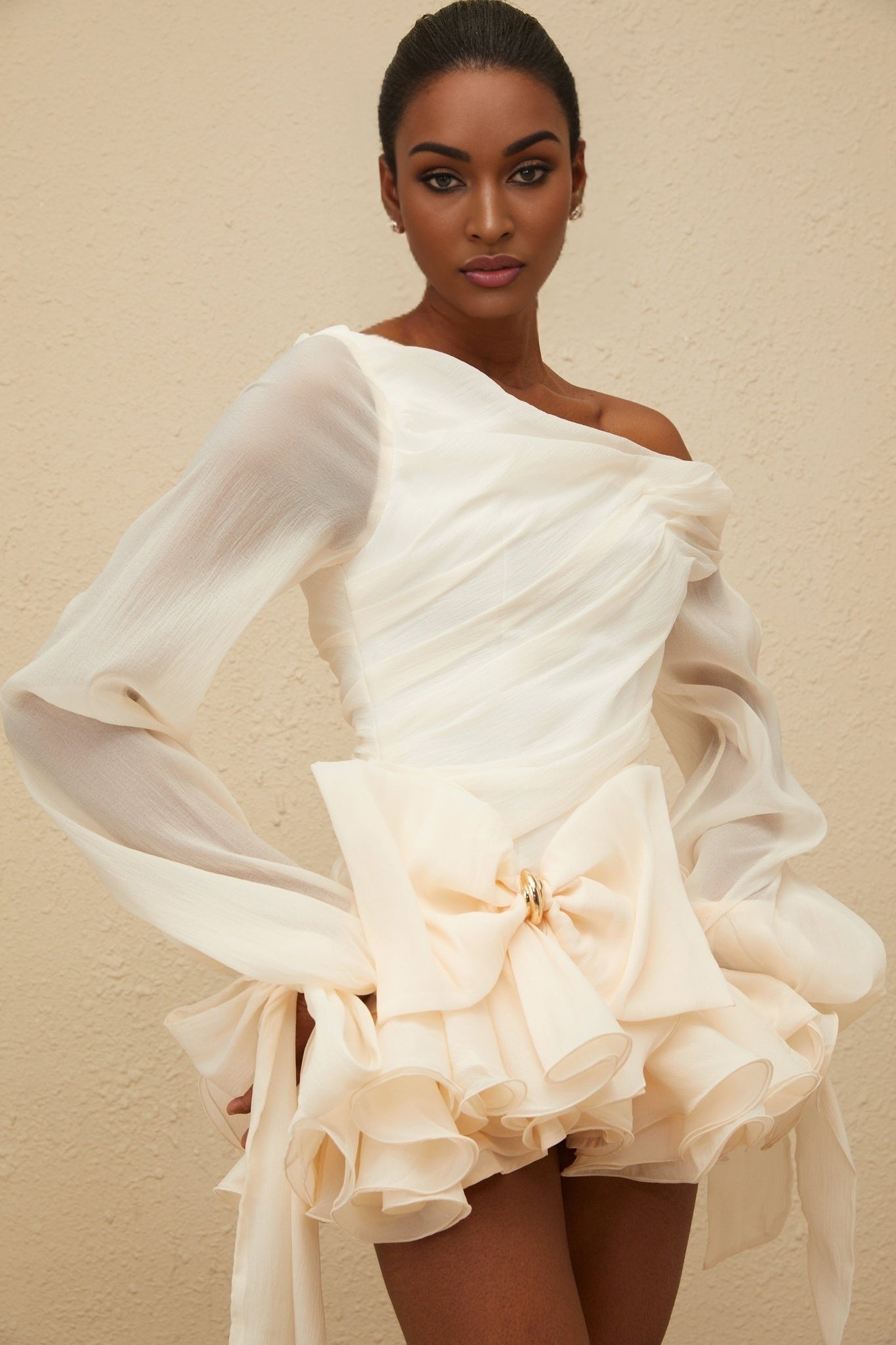 White one shoulder puff sleeve dress with oversized bowknot and bubble hem skirt