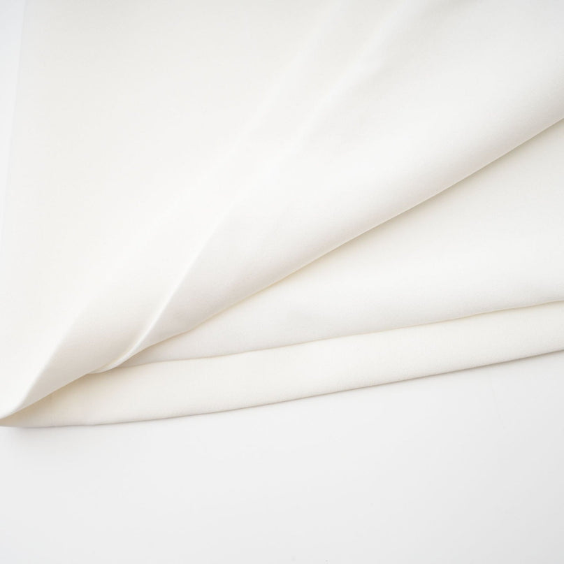 White ornate mini dress Xanthea with decorative details and short length