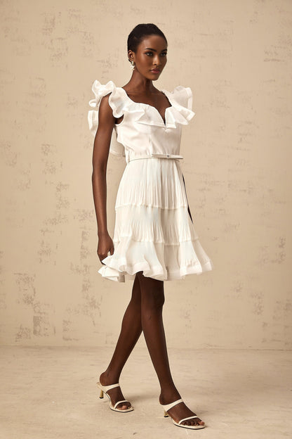White pleated mini dress with frilled neckline named Eliane