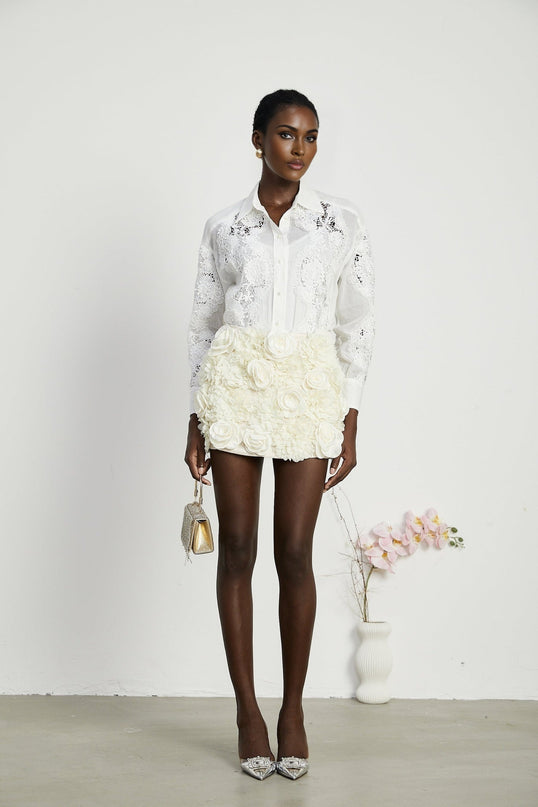 White shirt with lace embroidery details and cut out sections