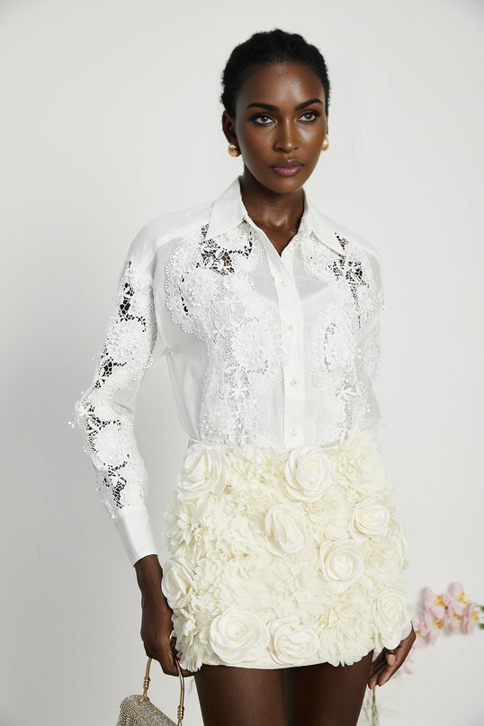 White shirt with lace embroidery details and cut out sections