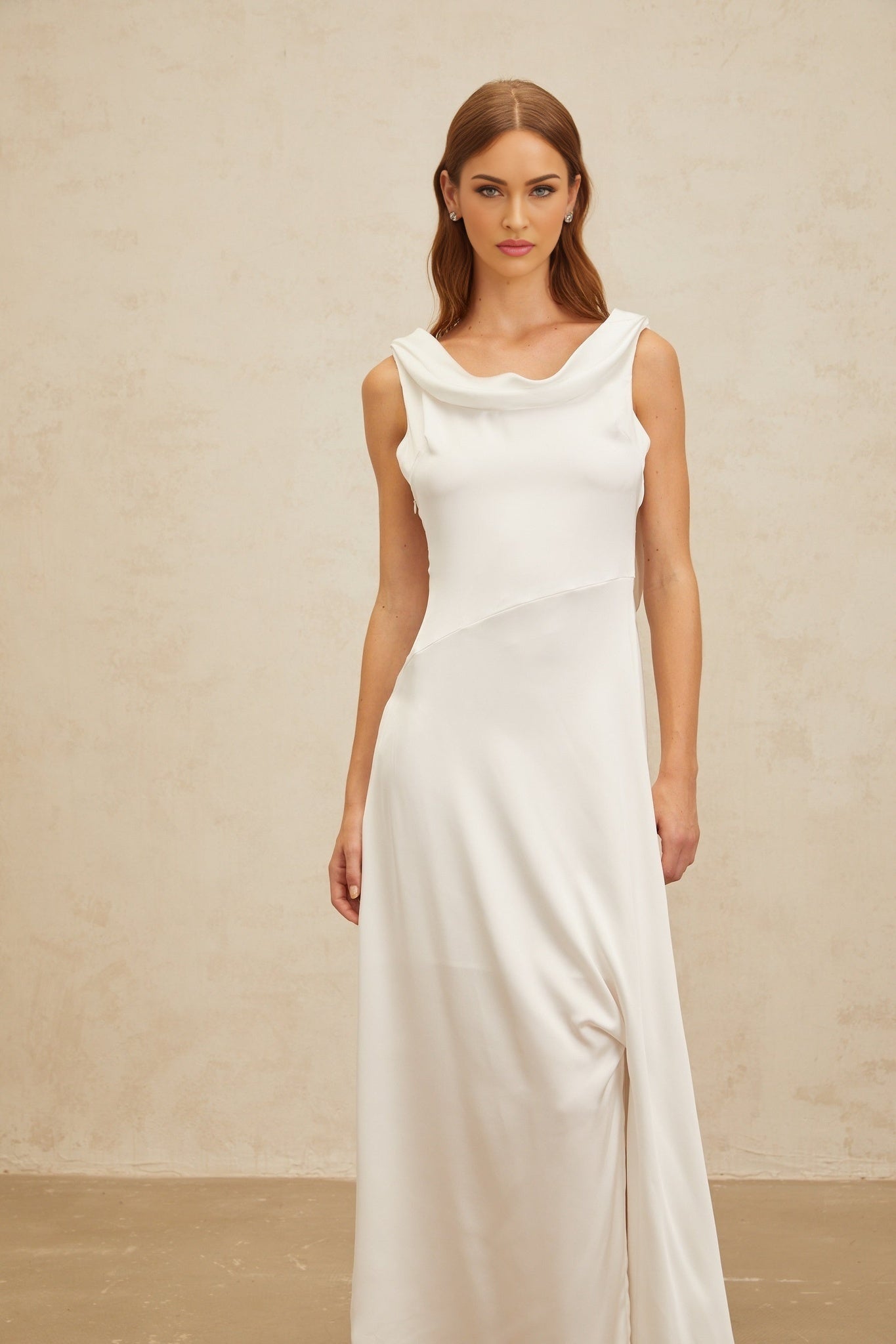 White sleeveless cowl neck maxi dress with twist detailing and satin finish