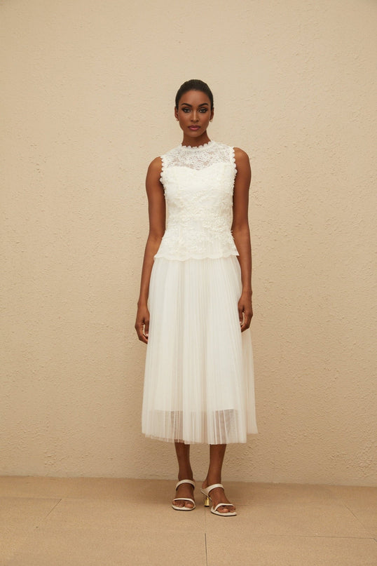 White sleeveless peplum waist midi dress with floral lace and sequin detailing