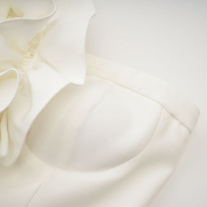 White sleeveless top with floral applique detail named Lucie
