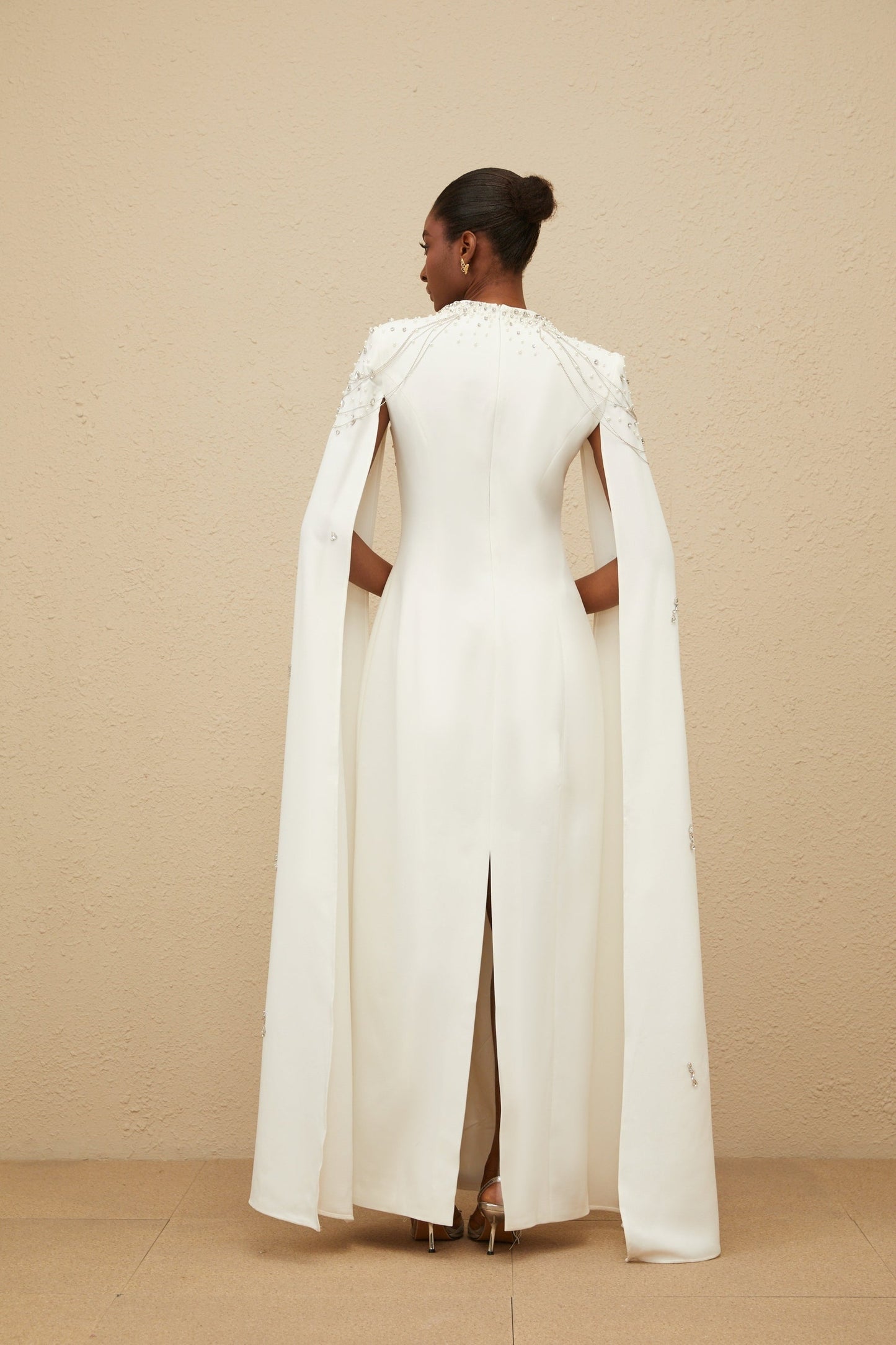 White Square Neck Sleeveless Cape Gown with Embellishments and Fringed Detailing