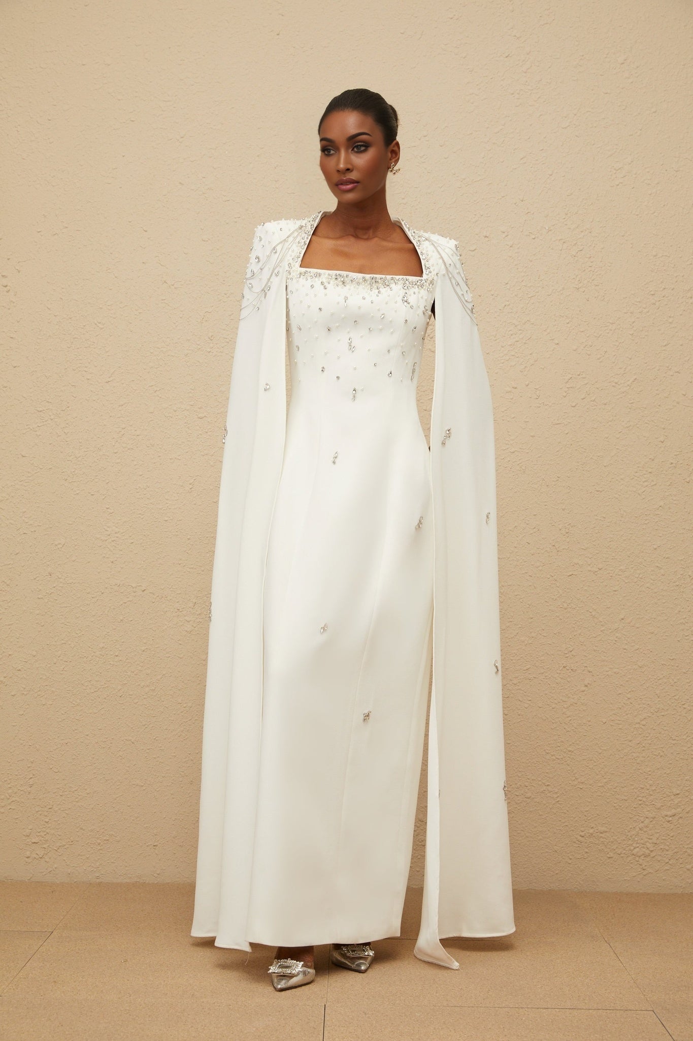 White Square Neck Sleeveless Cape Gown with Embellishments and Fringe Detailing