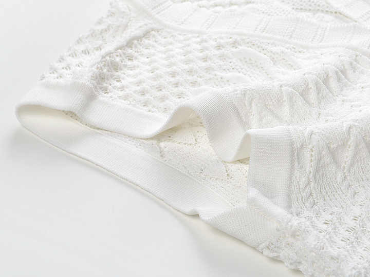 White textured knit A-line dress with button front and scalloped neckline