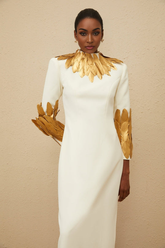 White Turtleneck Maxi Dress with Gold Feather Trim and Rear Slit