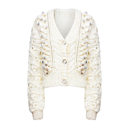White V-neck cardigan sweater with bubble sleeves and sequin embellishments