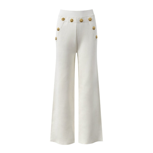 Wide-leg white pants with gold button detailing