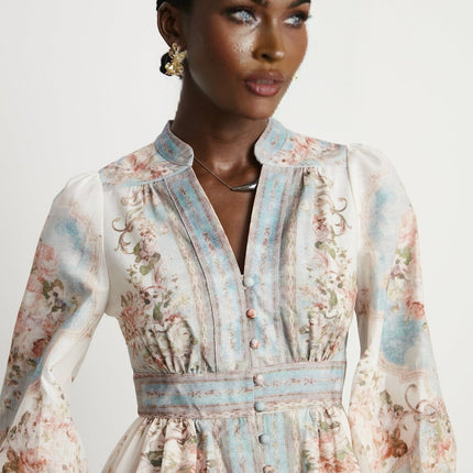 Willa White and Blue Floral Print Mini Dress with V-neckline and Long Sleeves