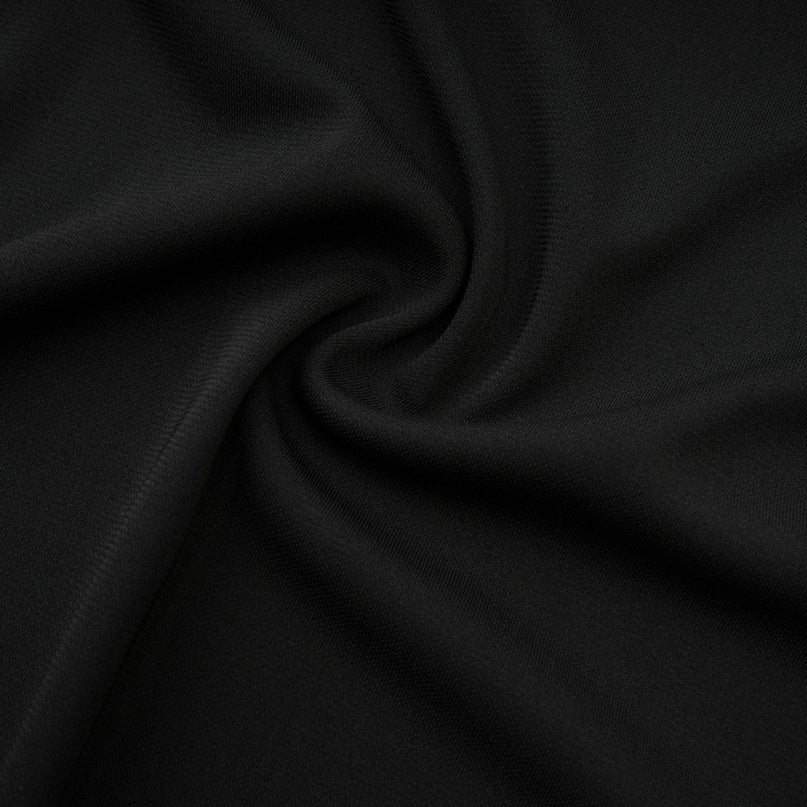 Winter Black Logo Motif Winter Skirt with Cut Out Detailing Flared Design Midi Length Asymmetric Hem Two Side Slits Rear Hook and Zip Fastening 88% Viscose 12% Spandex