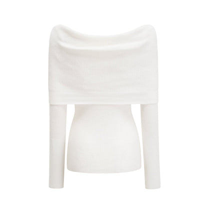 Woman wearing a beige knitted strapless long sleeve top with ribbed texture and a straight neckline