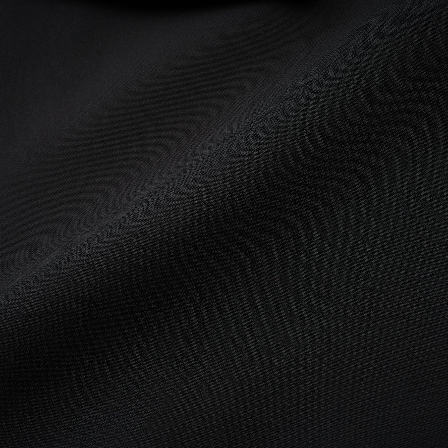 Black dress with long sleeves notched lapels scoop back buttoned cuffs fitted waistline crystal embellishment and front button fastening composed of 100% Polyester
