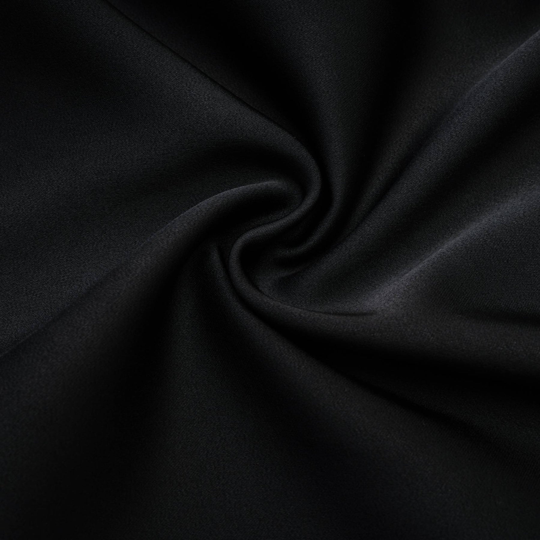 Anklelength black dress with spaghetti straps flower decoration at neck open back and 100% Polyester composition