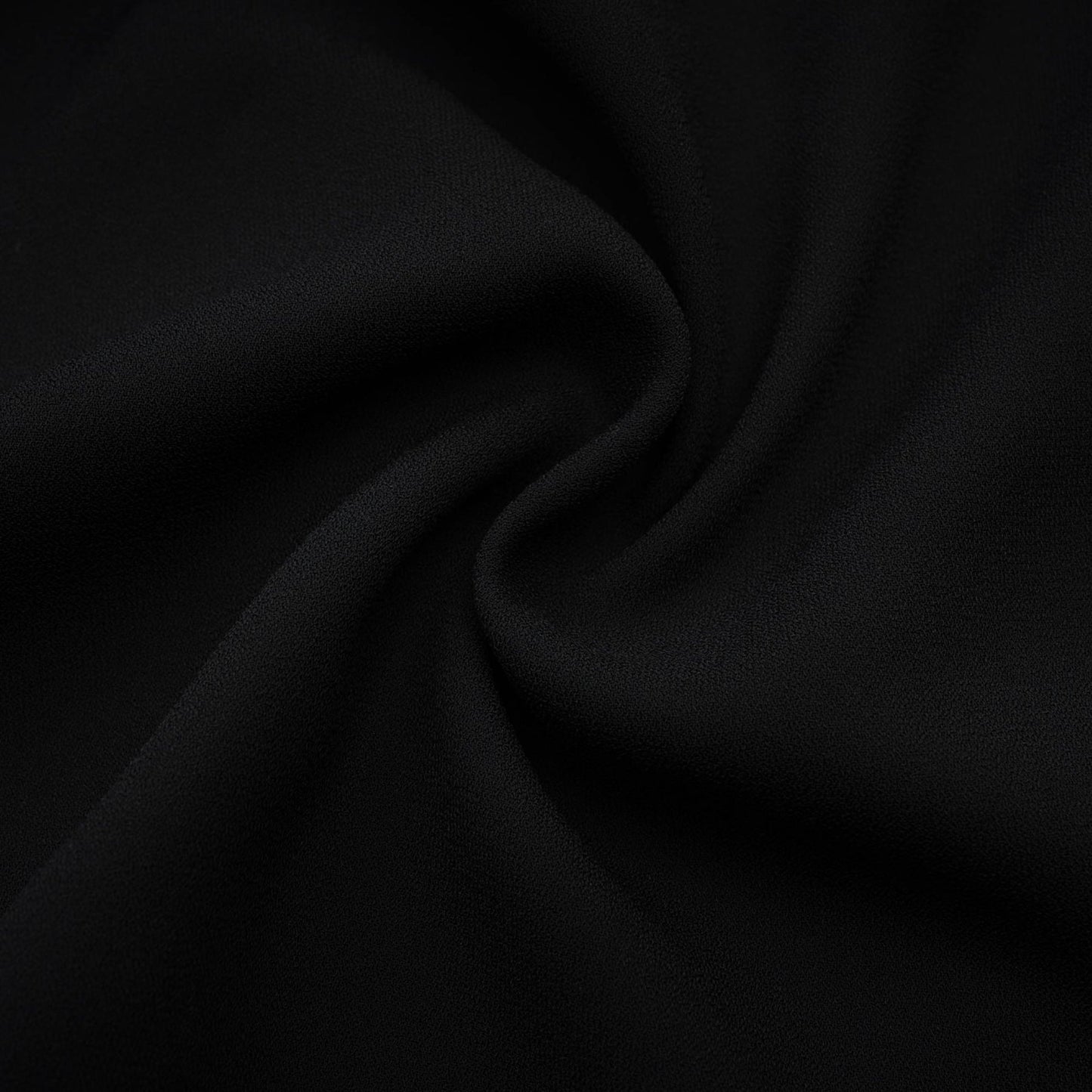 A black floral dress with spaghetti straps square neck and rear zip fastening featuring a flower decoration at the neck and an asymmetric design crafted from 80% Polyester and 20% Cotton