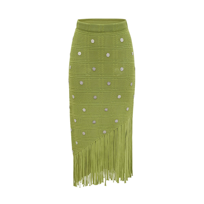 Woman wearing a green knitted top and matching skirt set with embellishments named Annette