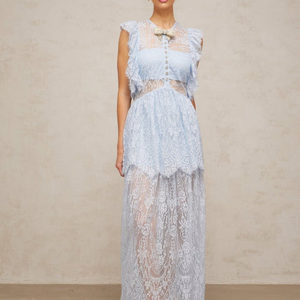 Woman wearing a long blue lace maxi dress with layered skirt and capucine neckline