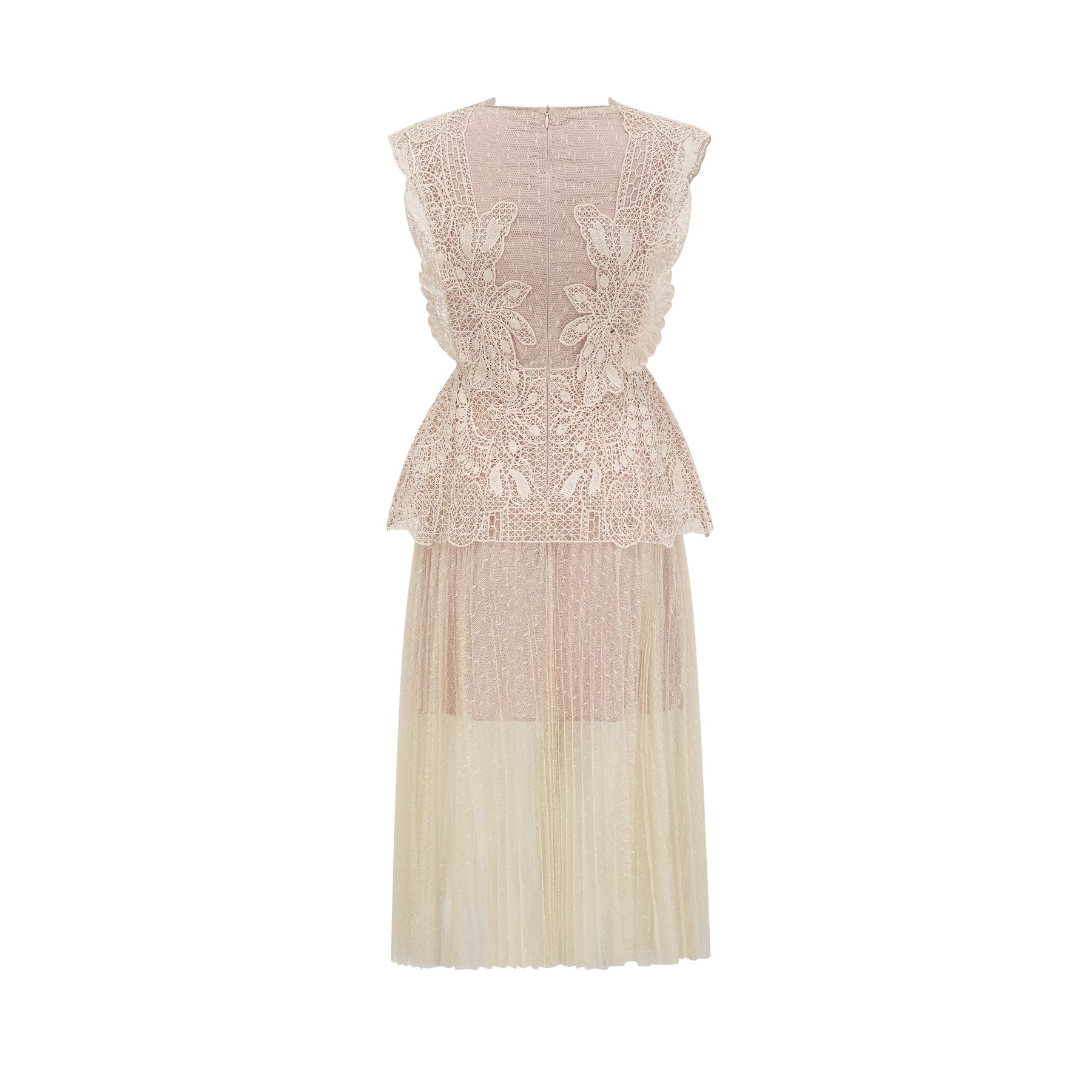 Woman wearing a neutral colored midi dress with floral lace panels and tulle fabric featuring delicate details and a feminine silhouette