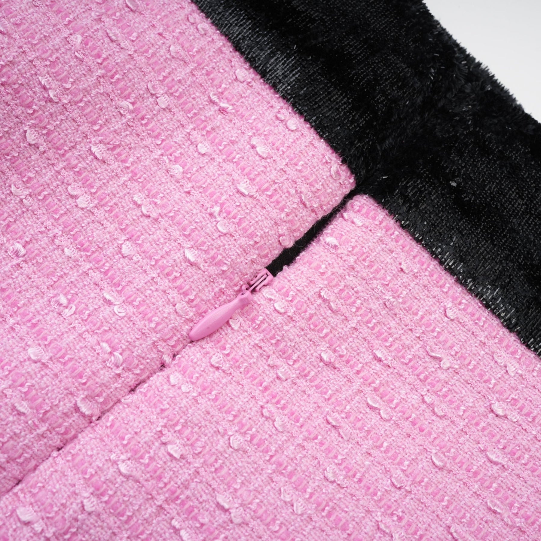 Pink jacket with Vshaped collar fulllength sleeves and front button closures  embellishments
