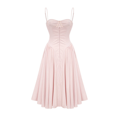 Pink designer dress with sleeveless bustier style delicate spaghetti straps and pleated skirt