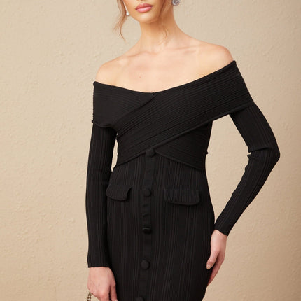 Woman wearing a short off shoulder dress with ribbed knit texture in light color