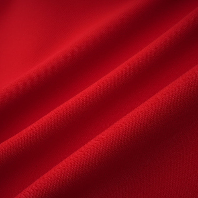 Woman wearing a short red dress with cap sleeves