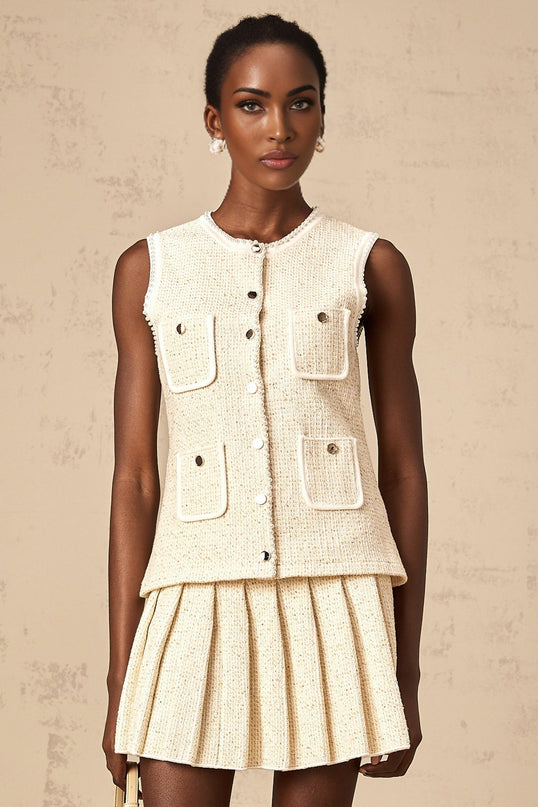 Woman wearing beige sequined knit vest top and matching skirt set