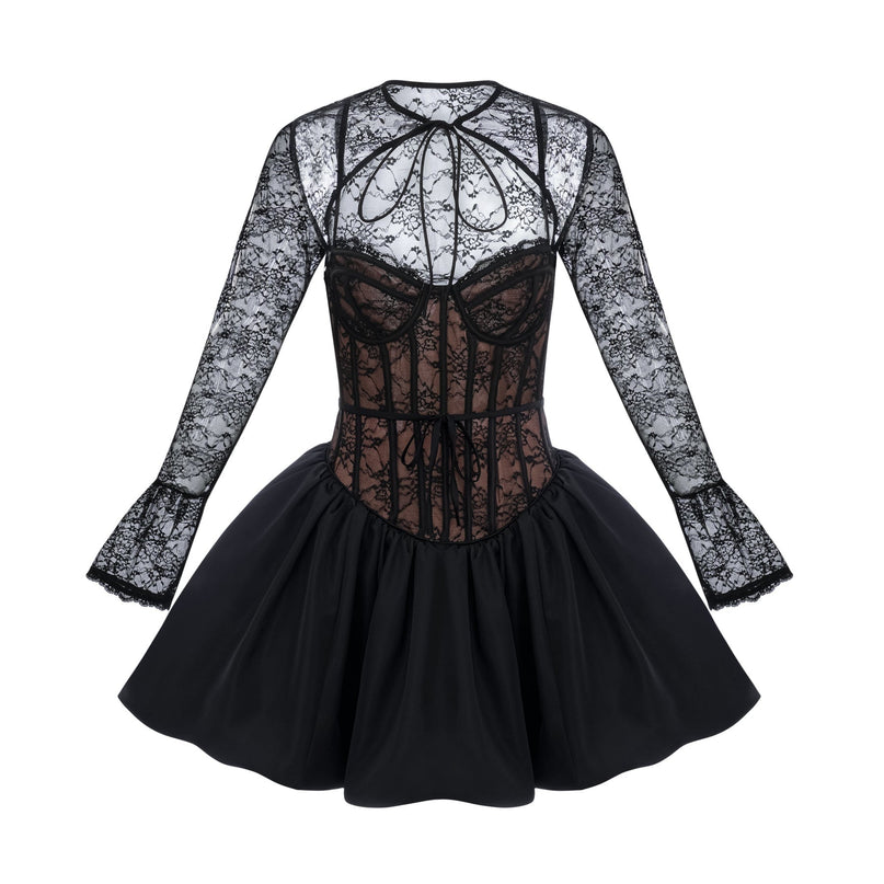 Woman wearing black floral lace vest over matching sleeveless dress with floral lace pattern