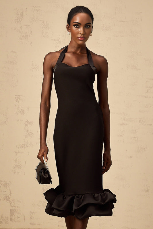 Woman wearing black halterneck midi dress with bubble hem and fitted waist