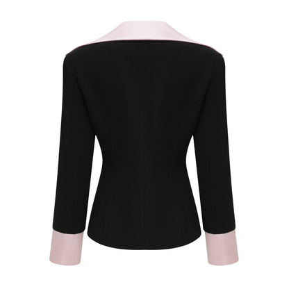 Black tweed dress with notched lapels cinched waist front bowknot detailing and contrast colors composed of 100% tweed
