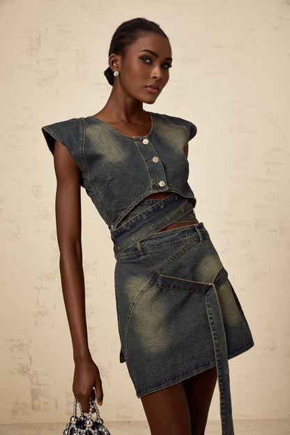 Woman wearing blue denim crossover top and matching skirt set