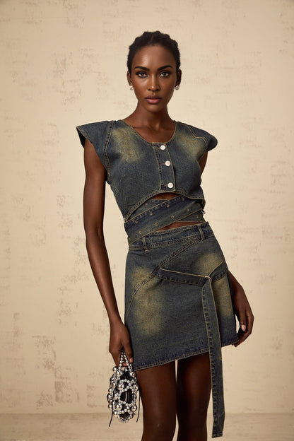 Woman wearing blue denim matching set with crossover top and skirt Fanny style