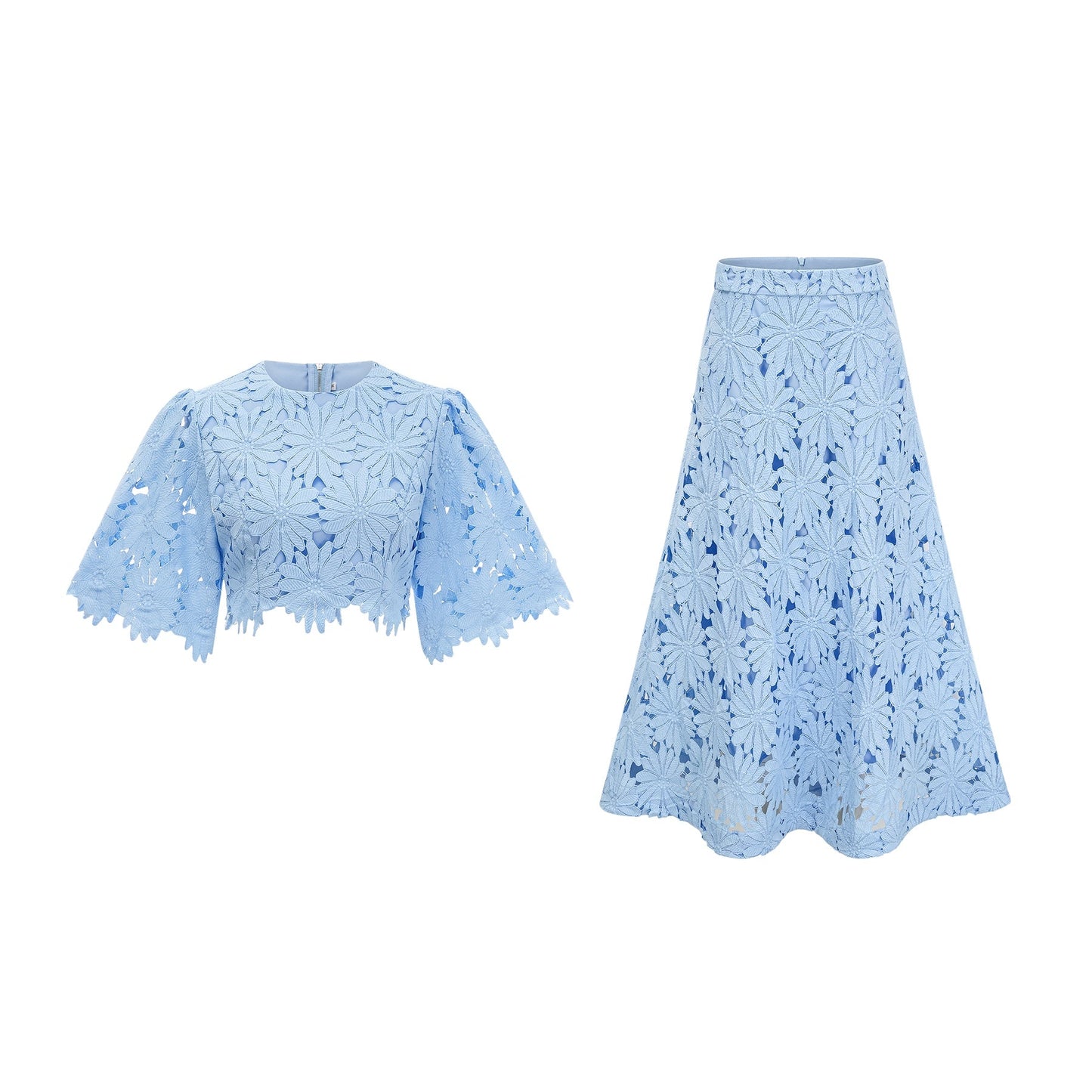 Woman wearing blue lace matching top and skirt set with guipure floral pattern and short sleeves