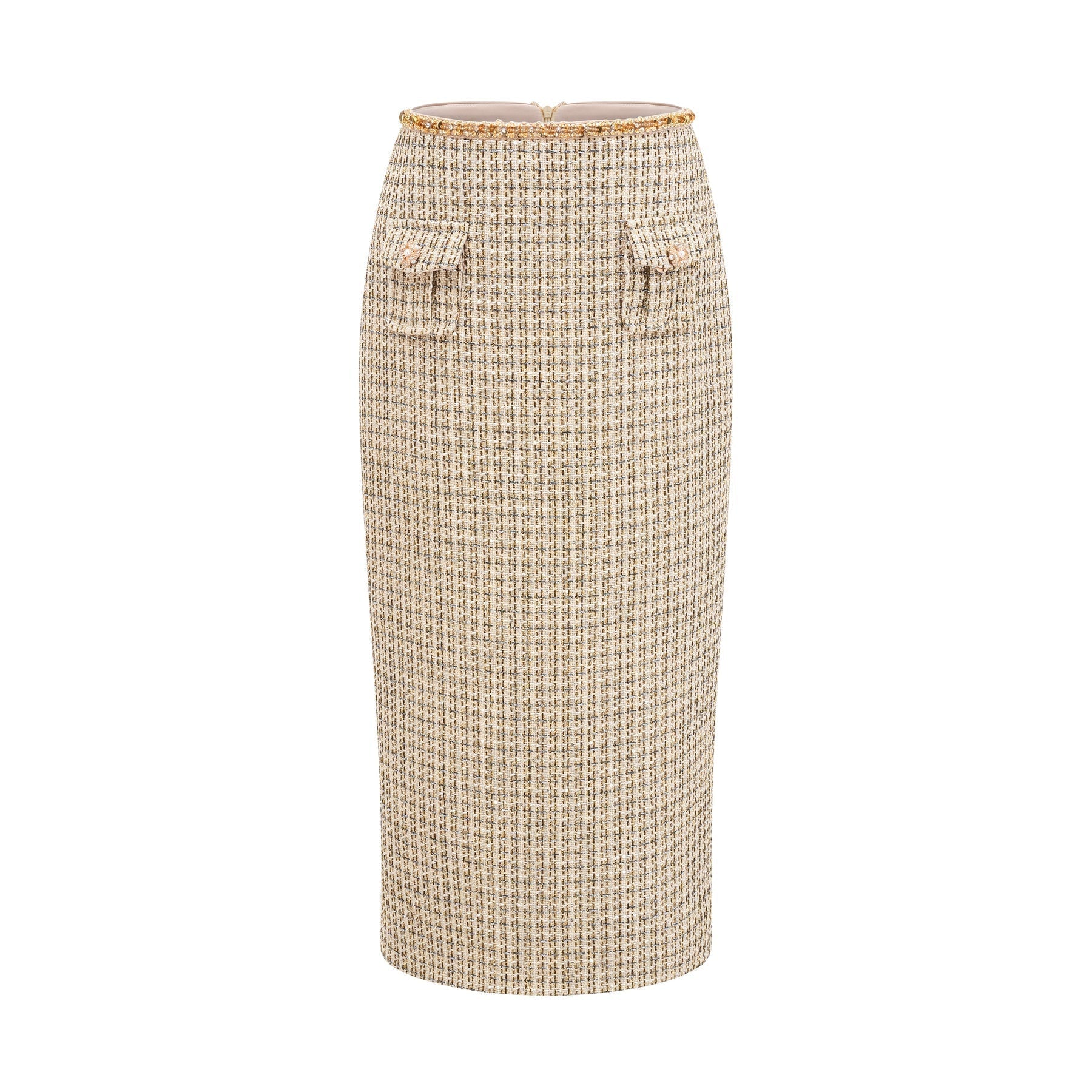 Woman wearing gold tweed jacket and matching skirt with sequin embellishments elegant coordinated outfit set