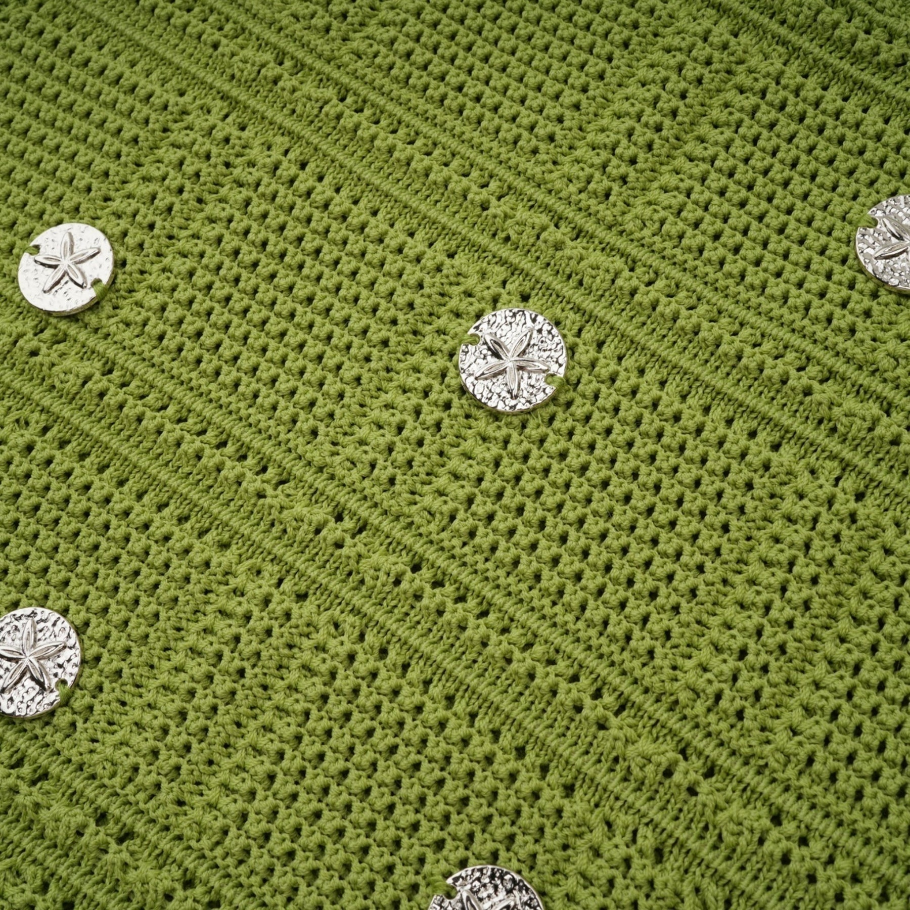 Woman wearing green knit top and matching skirt set with embellishments Annette style