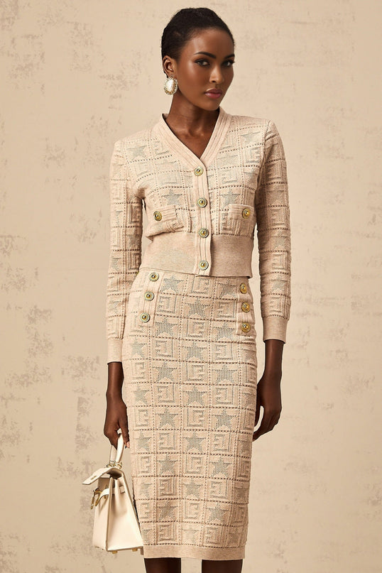 Woman wearing khaki cardigan and skirt set with star pattern crochet knit design