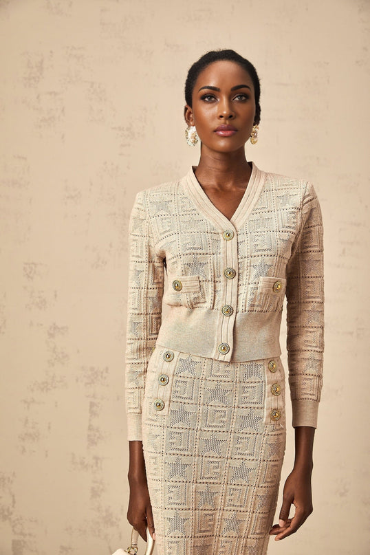 Woman wearing khaki matching set with star pattern crochet knit cardigan and skirt
