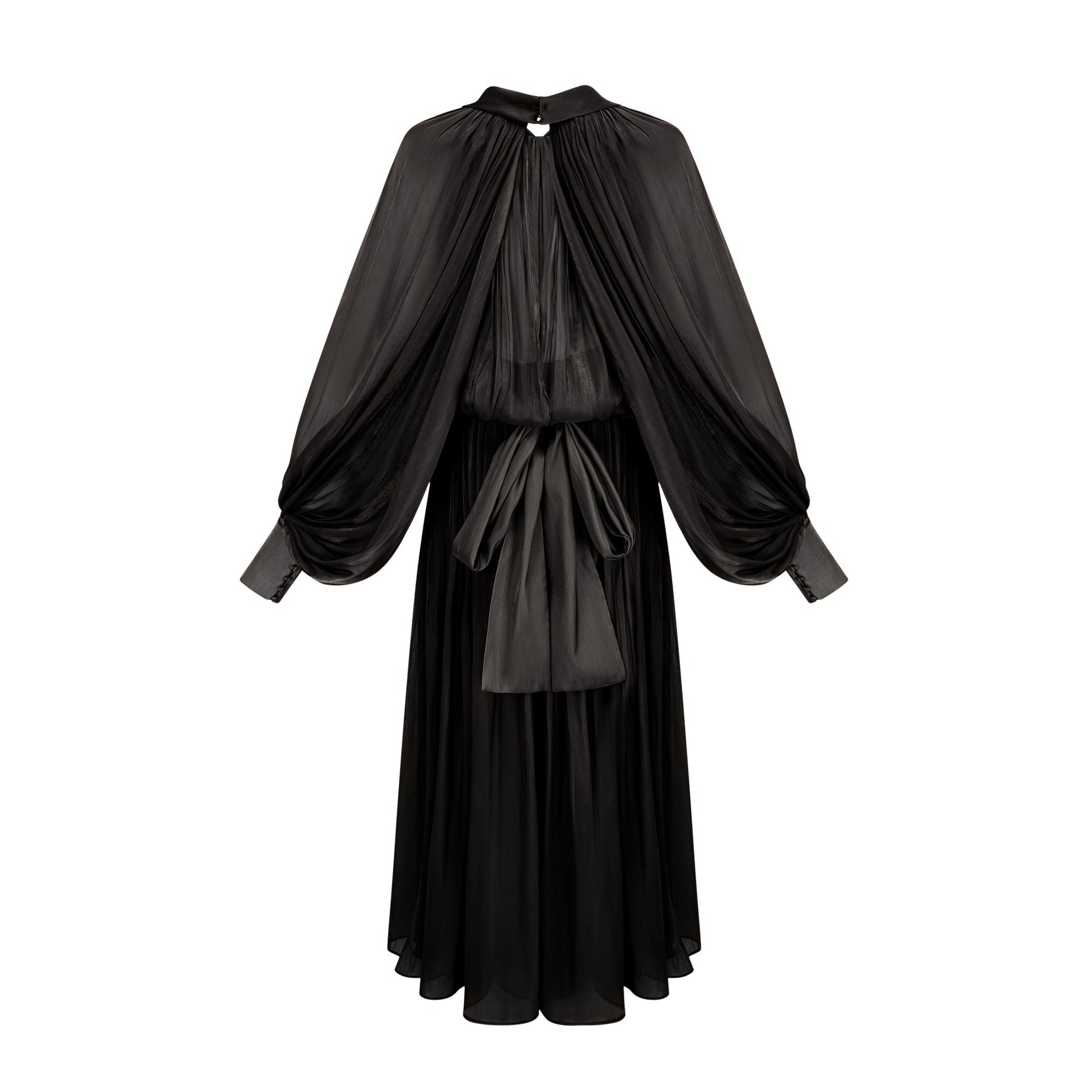 Woman wearing long black pleated satin maxi dress with flowing skirt and fitted bodice
