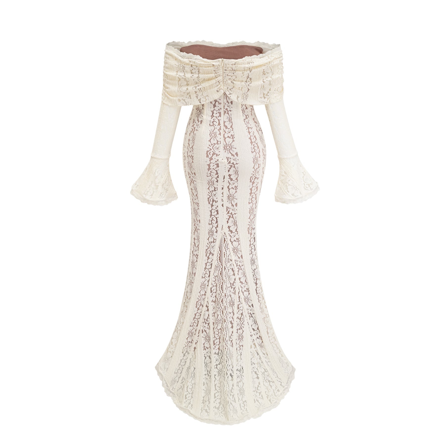 Woman wearing long neutral colored floral lace maxi dress with train detail
