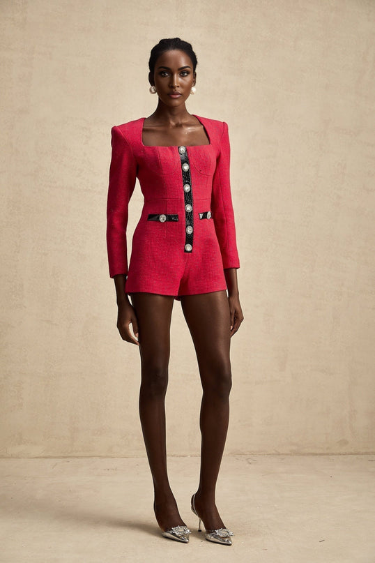 Woman wearing pink long sleeve bodysuit with cutout details on torso