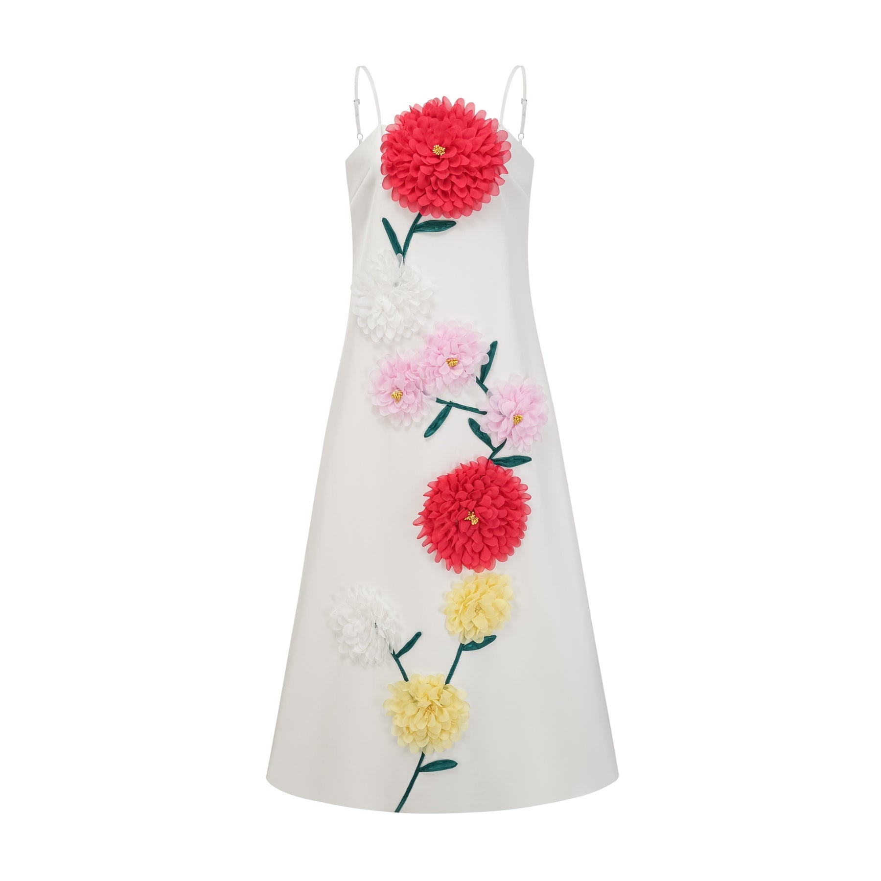 Woman wearing sleeveless white midi dress with three dimensional floral petal details