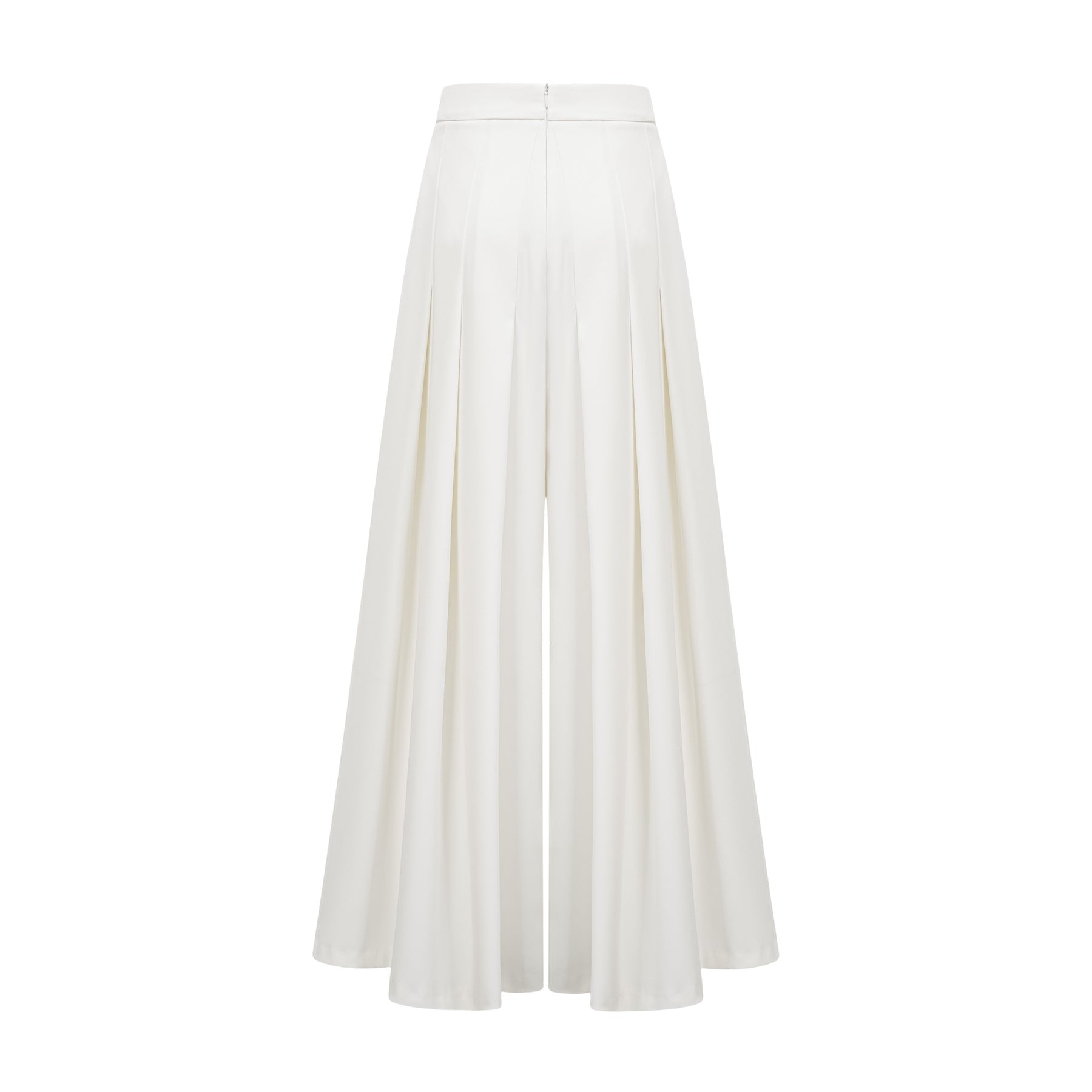 Woman wearing white creased top and matching trousers set Adele style outfit